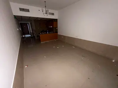 Studio for annual rent in Al Nuaimiya Tower C, Ajman. Separate American-style kitchen, balcony overlooking Sheikh Khalifa Bin Zayed Street, spacious
