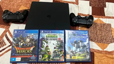 Sony play station 4 (PS4) in a very good working condition, along with 2 original Sony controllers.