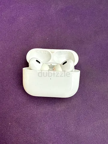 Apple AirPods with charging case and cable - used, working
