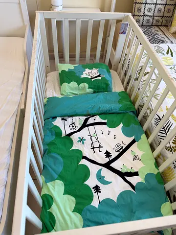 White wooden baby cot with Mattress