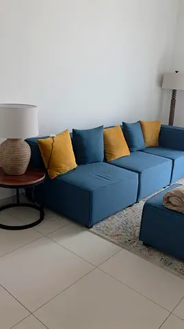 Blue modular sectional sofa – 3-seater with ottoman, good condition, Home center coffe table , lamp