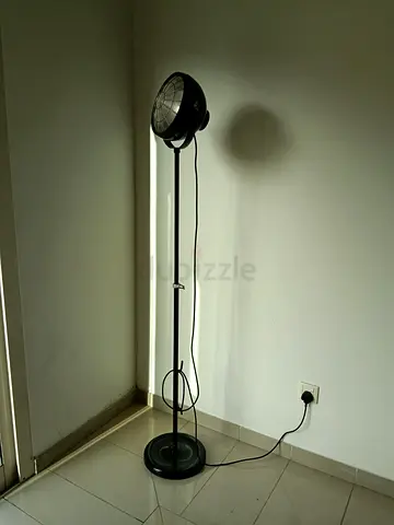 My industrial-style spotlight floor lamp