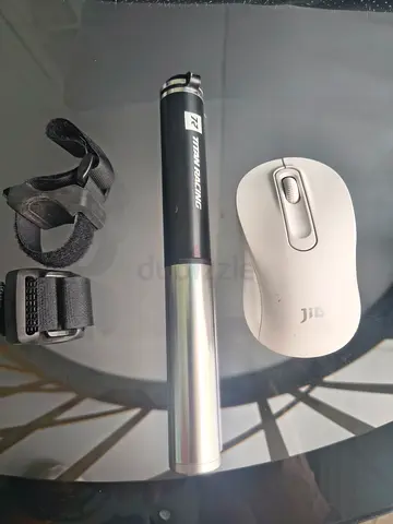 Titan Racing mini bike pump with mounting bracket and straps