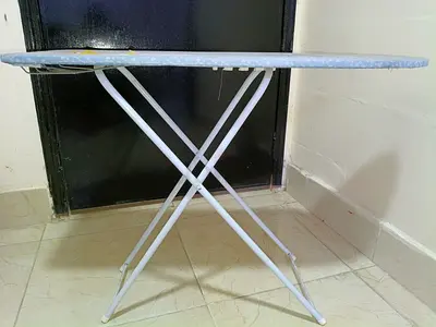 I’m selling my folding ironing board — foldable, used, good condition