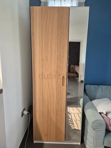 Wide/deep cabinet with 2 sliding metal drawers.