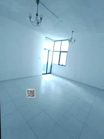 غرفه وصاله للايجار السنوى بابراج الفالكون الراشديه2 عجمان بلكونه واتنين حمام غرفه ماستر وباركنج مجانى