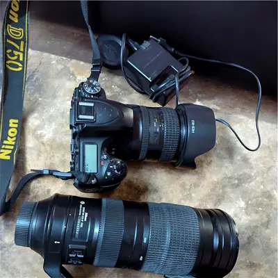 Nikon D750 DSLR body with 24-120mm 200-500mm telephoto zoom lenses and charger