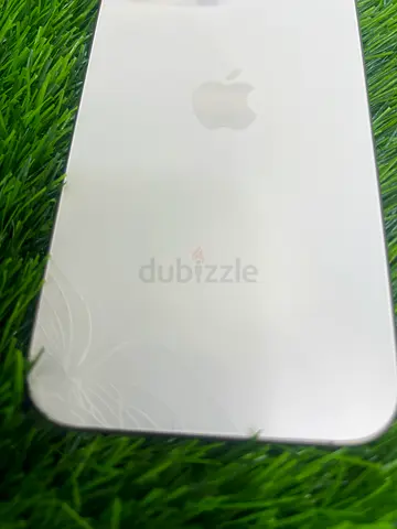 White Apple iPhone — rear glass cracked at corner (used)