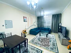 For monthly rent: a furnished one-bedroom apartment with a living room in Al Yasmeen Towers, located