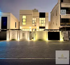 A very luxurious, modern villa with a full stone facade and an extremely luxurious interior with ver