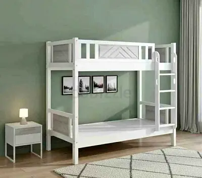 Brand New White wooden bunk bed — single over single with mattress.