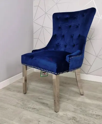 Navy velvet tufted accent chair with chrome legs (gently used)
