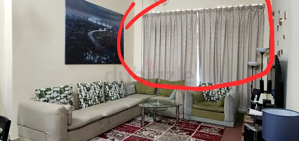 Beige curtain pair (used) - good condition