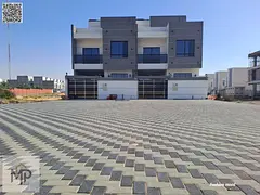 Townhouse_on a main road|large front setback of 20 meters|5 master rooms, majlis, 2halls, roof|centr