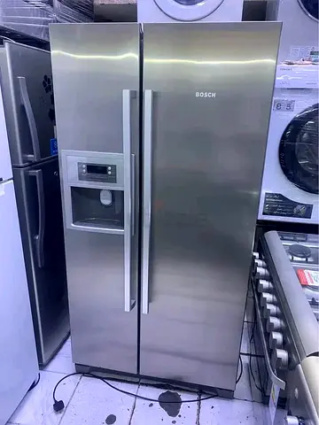 Siemens side by side refrigerator with water dispenser and ice mekar same like new condition working