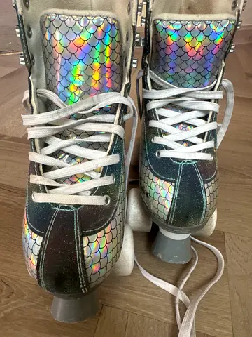 Holographic mermaid quad roller skates (used)
