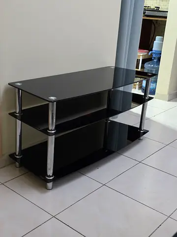 Black glass TV stand with three shelves - good condition
