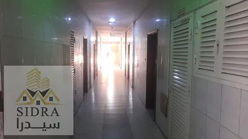 The building is located in Al Nuaimiya 1, Ajman, near the GVC site.