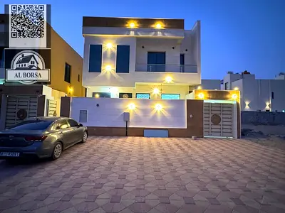 For rent in Al Yasmin, Ajman: 5 master bedrooms, living room, majlis, and maid's room. First occupancy. Central air conditioning.