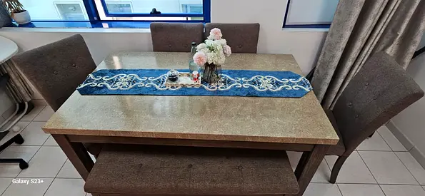 Dining table set with stone-look top, upholstered chairs and bench