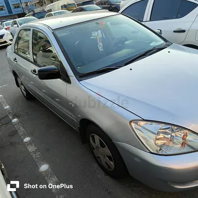 Sale for Mitsubishi lancer 2007 model with mileage 184,000 KM.