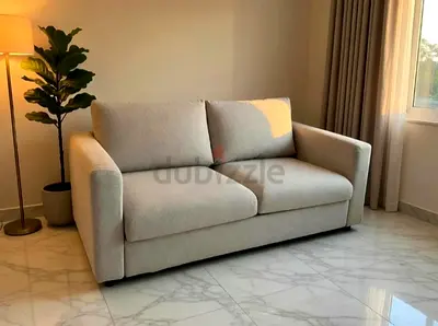 beige 2-seater fabric sofa excellent condition