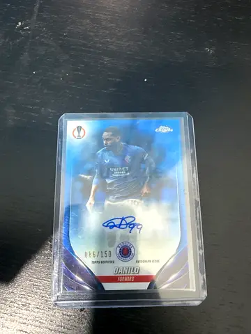 Autographed limited-edition football trading card (numbered, in protective case)