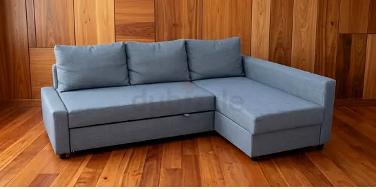 Light grey L-shaped sofa with chaise and under-seat storage