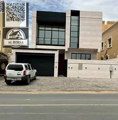 For rent in Al Yasmin, Ajman: 5 master bedrooms, living room, majlis, and maid's room. First occ
