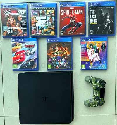 PS4 Slim with controller and 7 games — Spider-Man, GTA V, The Last of Us