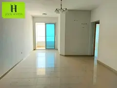 Spacious 1BR Balcony Wardrobe Al Taawun