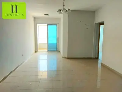 Spacious 1BR Balcony Wardrobe Al Taawun