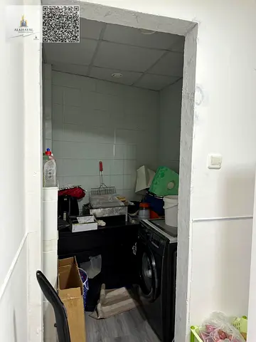 "For annual rent in Ajman, Corniche Towers, full sea view, two bedrooms, and a living room."