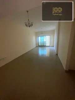 Two bedrooms, a living room, a balcony, and a spacious area in Al Nuaimiya 3.