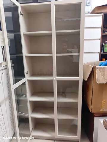 White glass-door cabinet with multiple shelves - good condition