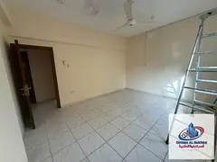 The largest and best-priced 2-bedroom apartment with a living room in Al Ghuwair area, featuring a b