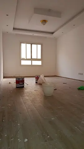 2BR apartment for rent in Al Zahia–Muwaileh, 3 baths, balcony, central AC, high finish, AED 54,000, 4–6 payments.