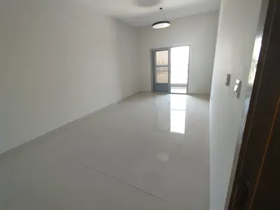 One-bedroom apartment with living room - Al Jurf 2, Ajman - Central air conditioning - Family accommodation - 2 bathrooms - Balcony