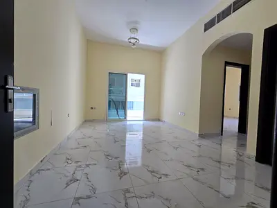 بناية جديدة غرفة وصالة للايجار السنوي مع باركن للسيارة وتكييف مركزي مع بلكونة وتشطيبات جديدة بسعر مميز