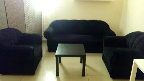 Black 3-seater sofa with 2 armchairs and coffee table — used