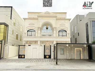 Luxury villa in Al Aaliyah, Ajman, ready for immediate occupancy, featuring high-end finishes and spacious living areas. Freehold ownership.