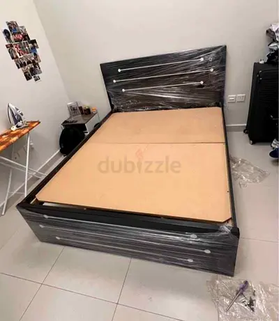 Dark wooden bed frame with headboard - used, good condition