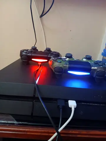 PlayStation 4  1TB + 2 DualShock 4 Controllers and 85 games