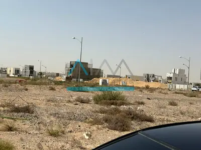 PREMIUM LOCATION FRONT OF PARK AND POOL PLOT IN DAMAC HILLS 2