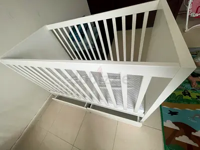 I’m selling a white wooden Babyshop baby cot with the mattress . Good condition