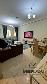 One-bedroom apartment with a living room for annual rent in Orient Towers, with a creek view