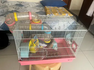 Small pink hamster/gerbil cage with clear tunnel and accessories