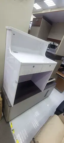 White reception desk Im selling — storage  lockable drawer