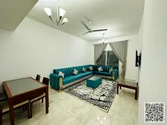 For monthly rent: Luxurious furnished one-bedroom apartment with a living room, in Ajman, Al Rawda 3