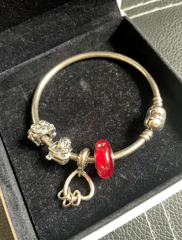 Pandora silver bangle w/ 4 charms (red glass bead and heart charm)